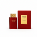 Shaghaf Oud Ahmar perfume bottle and packaging on a warm-toned background with leaves and bats.
