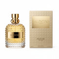 Valentino perfume bottle and packaging on a table with a neutral background
